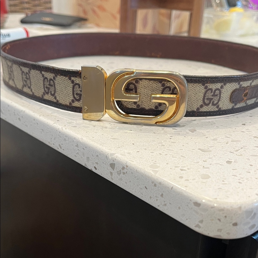 Vintage Gucci monogram belt . Fits waist size 25-26